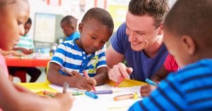 Teacher coloring with kids